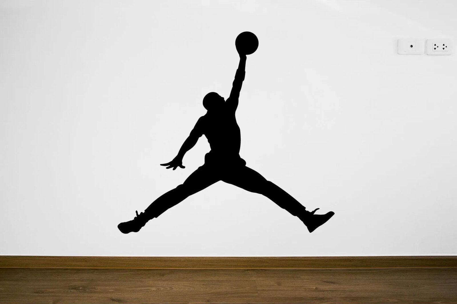 Lepy.cz Samolepka na zeď Jordan - basketbalista Velikost (šířka x výška): 40x37cm